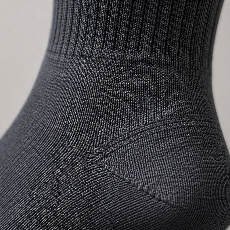 Chaussettes mi-mollet homme macro détail tricot